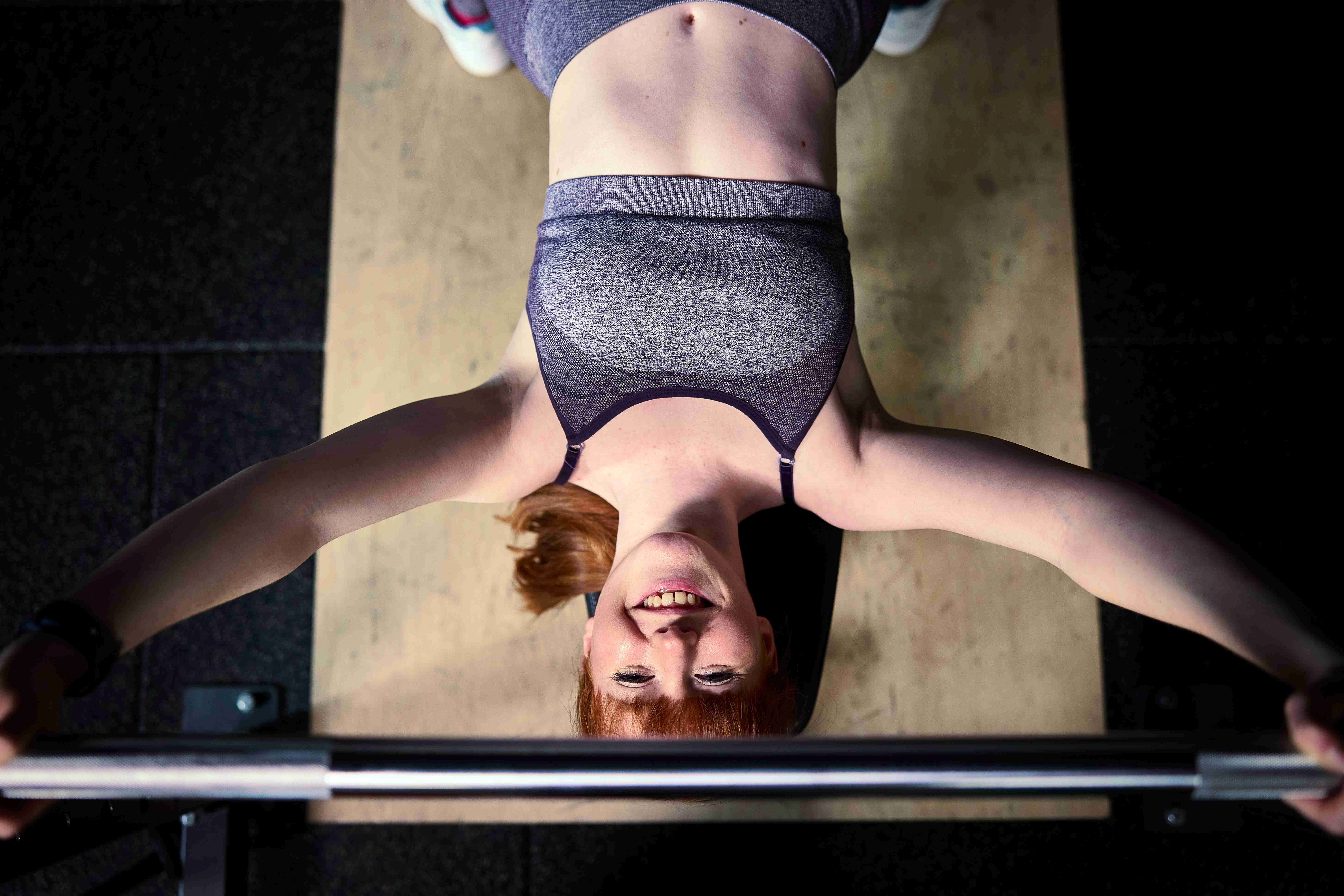 woman doing bench press